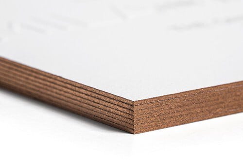 A stack of invitations showing the edge painting on them